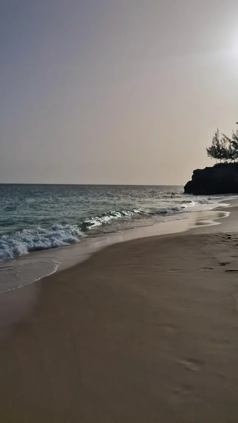 Vertical View of Mullet Bay Beach on St. Maarten Island on Golden Hour Video stock 344036124