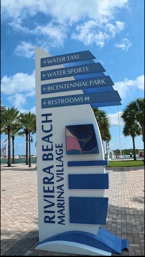 Vertical View: The New Riviera Beach Marina Village Waterfront and Skyline Stock Footage 330103067