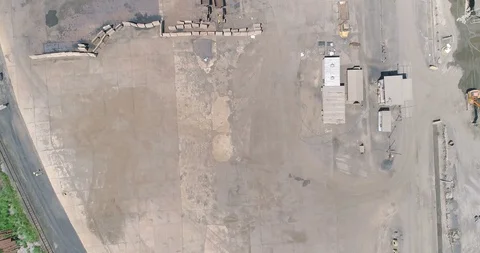 Vertical view of nondescript concrete industrial platform barren and lifeless Stock Footage 85957832