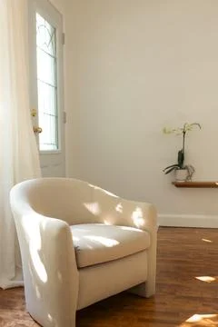 Vertical view of pale beige comfortable armchair Stock Photos