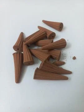 Vertical View Pile of Ribbed Brown Incense Cones 写真素材