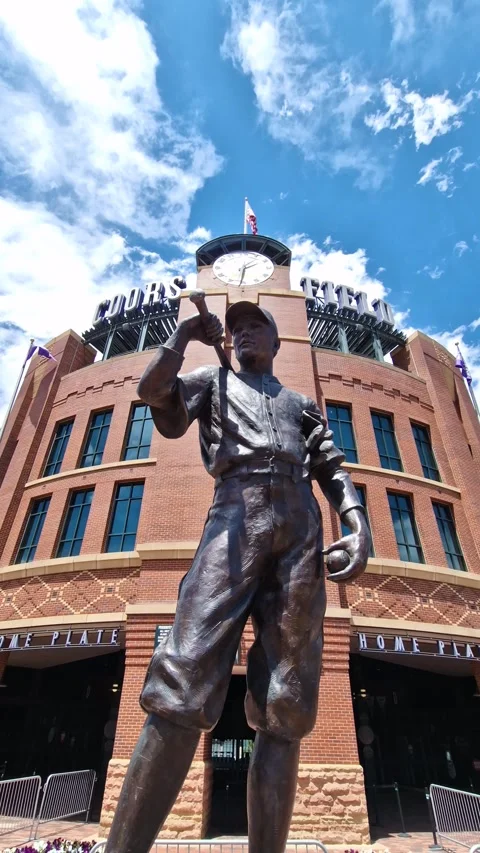 Vertical View, The Player Statue in Front of Coors Field Baseball Park in Stock Footage 346648739