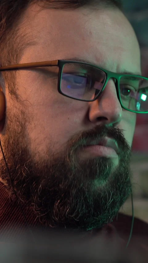 Vertical View, Portrait of Man With Glasses Looking on Desktop Computer Monitor Stock Footage 306659717
