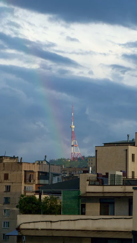 Vertical View: Rainbow Over Tbilisi TV Tower Video stock 334184458