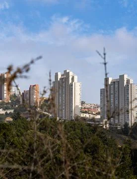 Vertical view of a residential complex surrounded by nature Stock Photos