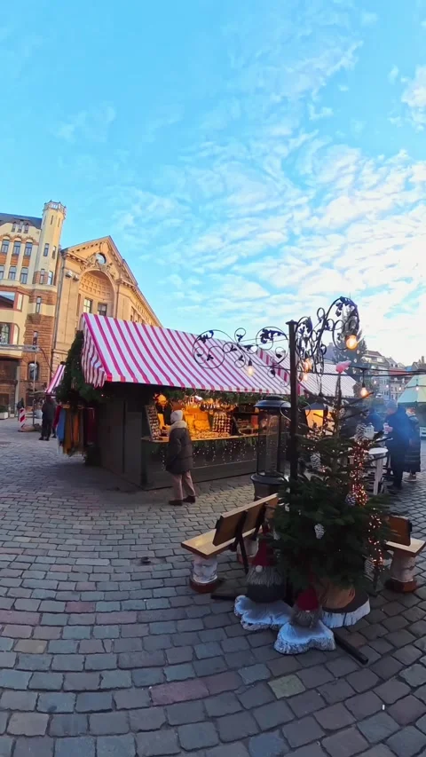 Vertical view of Riga Christmas market food stall with wood-fired smoker Stock Footage 329019191