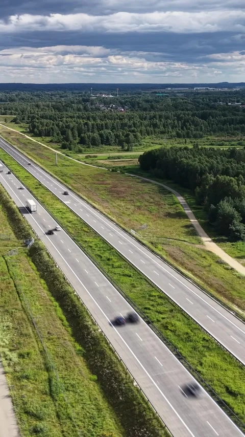 Vertical view. Road traffic flowing along a divided highway in Poland Stock Footage 348630827