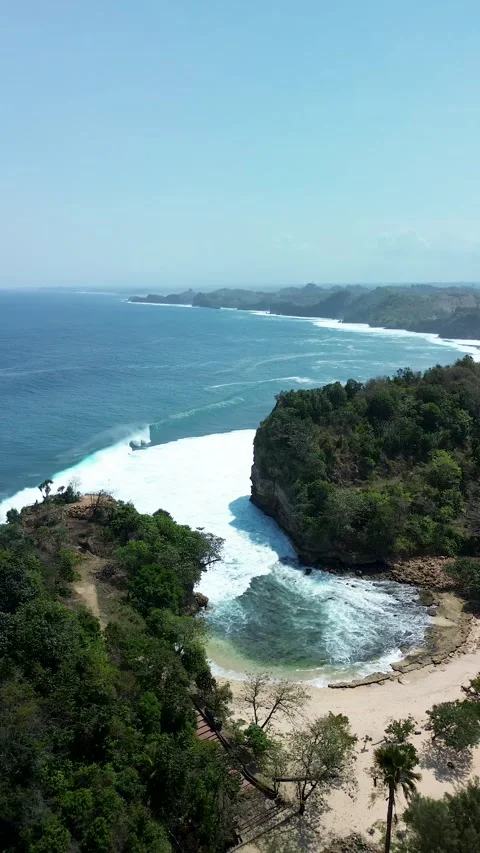 Vertical View of Rock Formations at Batu Bengkung Beach August 6 2026 Video stock 342838616