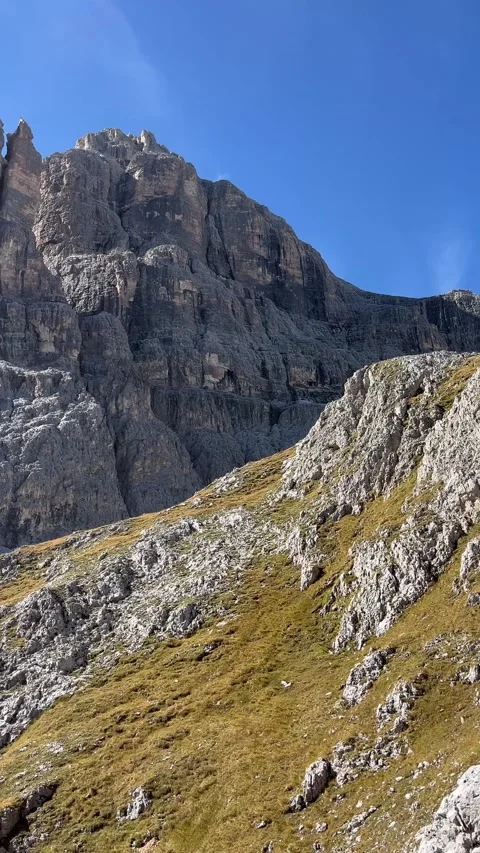 Vertical View of Rocky Peaks in the Dolomites, Italy on a Sunny Day Stock Footage 330961092