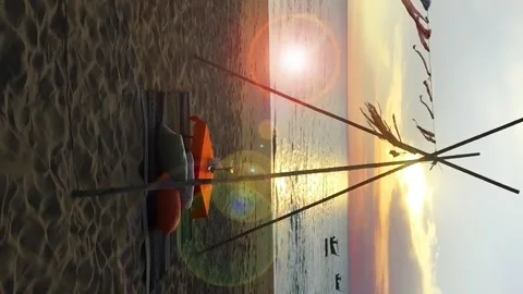 Vertical view of Romantic dinner table on tropical summer beach Stock Footage 155437717