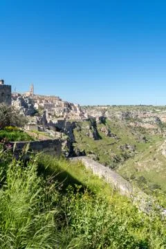 Vertical View of the Sassi of Matera on Blue Sky Background. Matera, South of Stock Photos