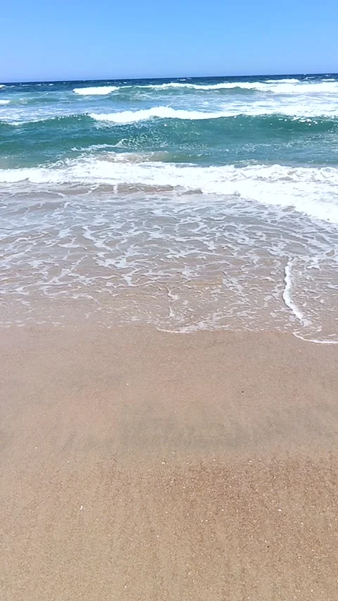 Vertical view of the sea and its waves of man first person view Stock Footage 233599867