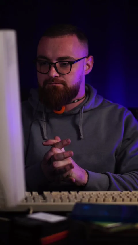 Vertical View, Software Developer in Front of Monitor Screen of Computer From Stock Footage 302972650