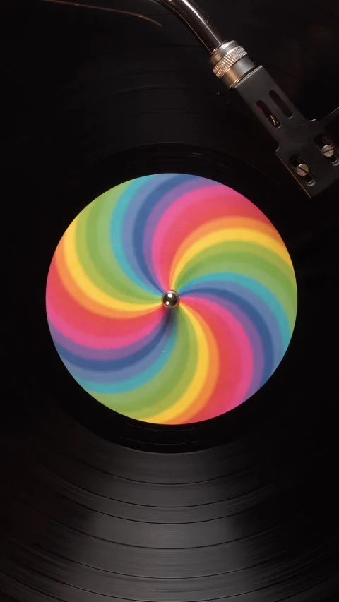 Vertical View of Spinning Vinyl Record With Rainbow Colors, Top Down Stock Footage 339690225