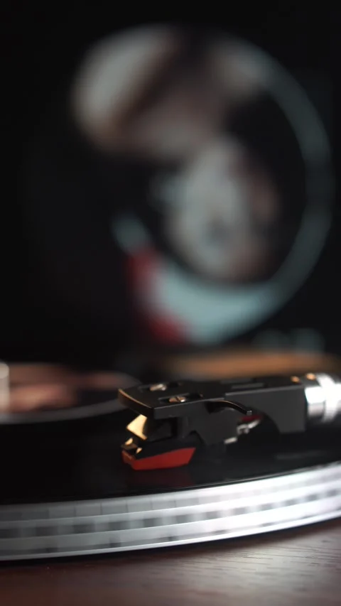Vertical View, Starting Playback of Vinyl Record With Mirror Reflection, Close Stock Footage 338434989