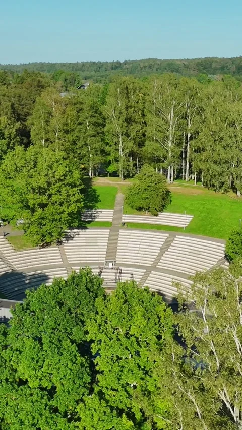 Vertical View Of Sun Hill Open-Air Stage Setting On Green Lush Nature During Video stock 317211810