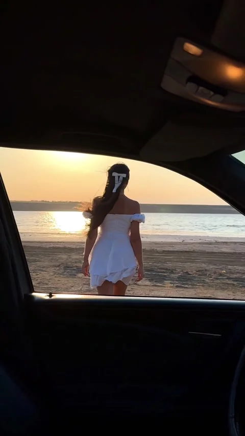 Vertical View of Sunset Reflection in Car Side Mirror Stock Footage 342134197