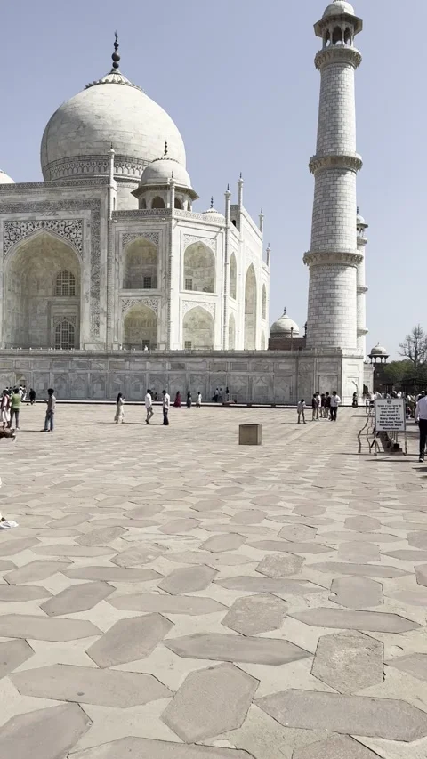 Vertical view of Taj Mahal marble facade and minaret courtyard in Agra India 動画素材 343148240