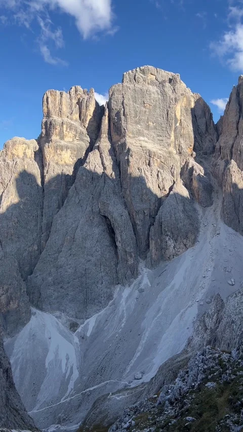 Vertical View of Towering Dolomite Rock Spires in the Italian Alps Stock Footage 330961096