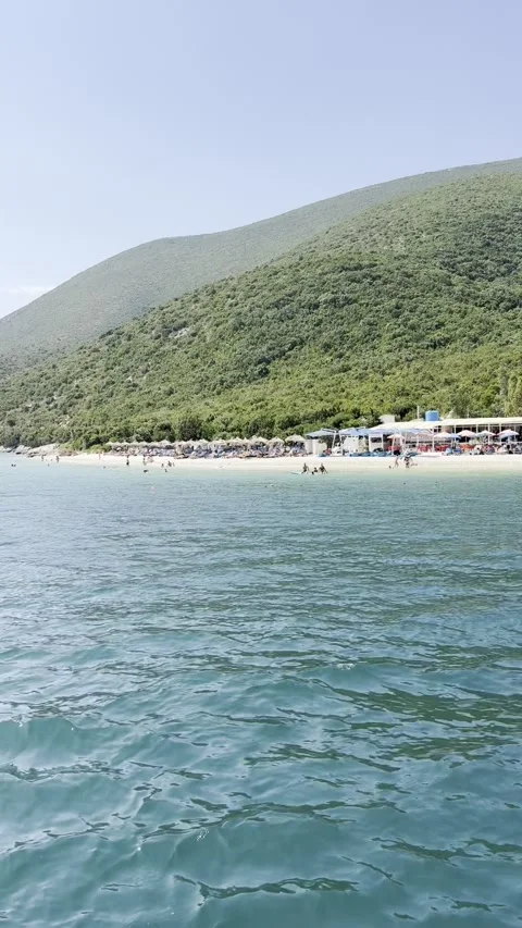 Vertical view of tropical beach and open sea from boat in Vlore Albania Видео 342746306