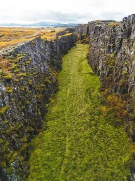 Vertical view of two tectonic plates meeting visible on the surface of Earth - Stock Photos