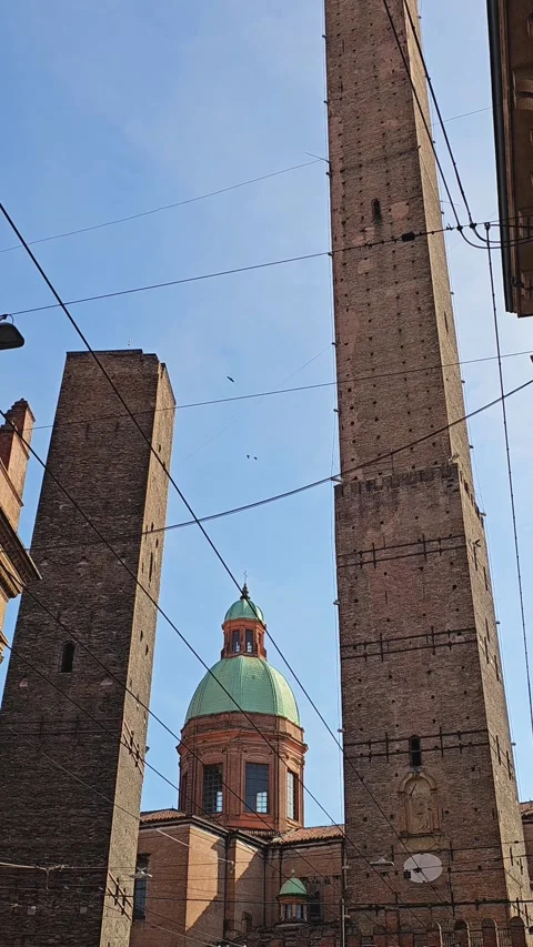 Vertical view of the Two Towers and church dome in Bologna, Italy Stock Footage 335218333