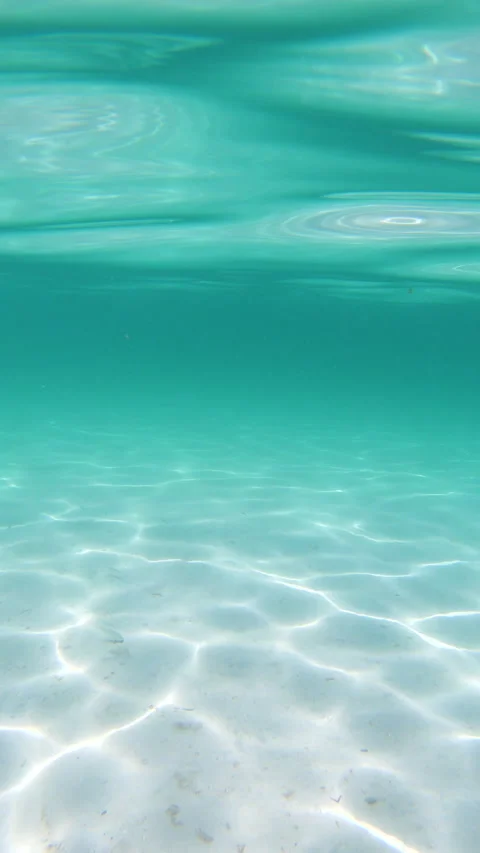 Vertical view of underwater caustics in Sardinia Stock Footage 337243753