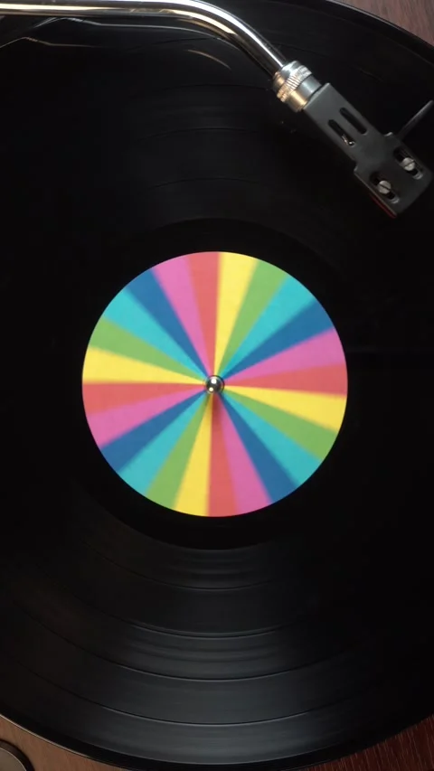 Vertical View of Vinyl Record, Starting Playback and Spinning on Turntable, Top Stock Footage 336259238