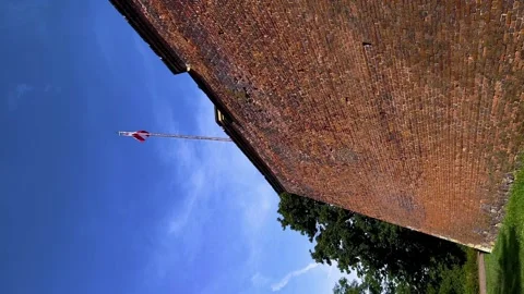 Vertical View Of The Wall Of Brno Castle Špilberk With Flying Flag Stock Footage 264033381