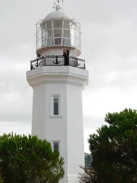Vertical view of white lighthouse in seaside resort of Batumi, Georgia Stock Photos