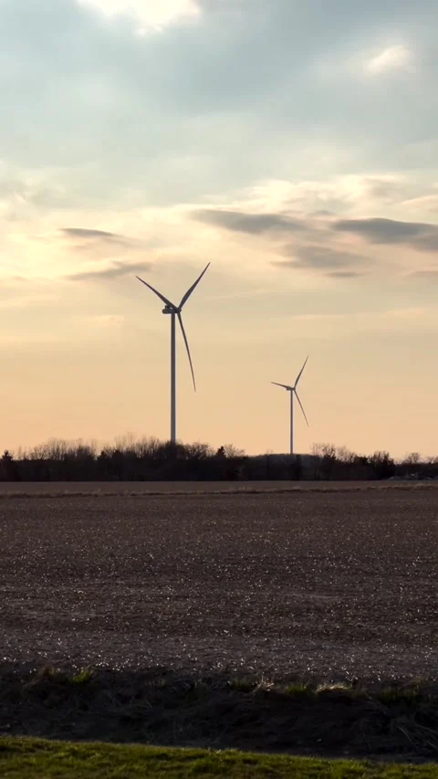 Vertical view of wind turbines at sunset Stock Footage 238490046
