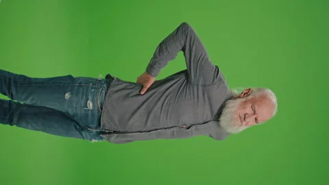 Vertical View.Green Screen.An Old Man Has a Backache. Stock Footage 249359490