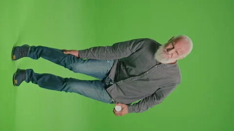 Vertical View.Green Screen. An Old Man Who Has Pain in His Leg. Stock Footage 263392936