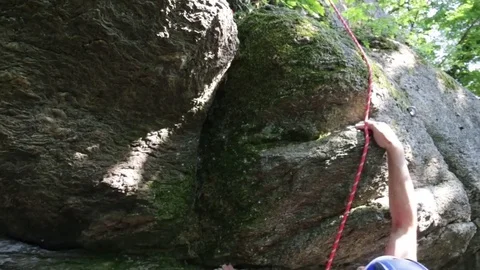 Vertical wall climbing - low angle shot Stock Footage 80864438