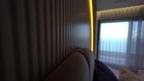 Vertical Wall Panels and Modern Lighting in Room Stock Footage 310036643