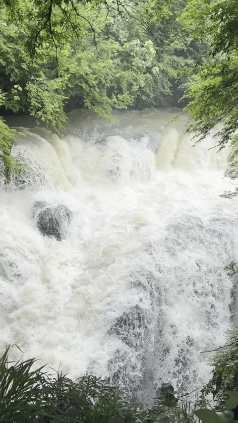 Vertical waterfall crashing over rocks in gorge, Georgia Stock Footage 345967790