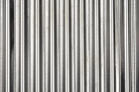 Vertical wavy metal texture background Stock Photos