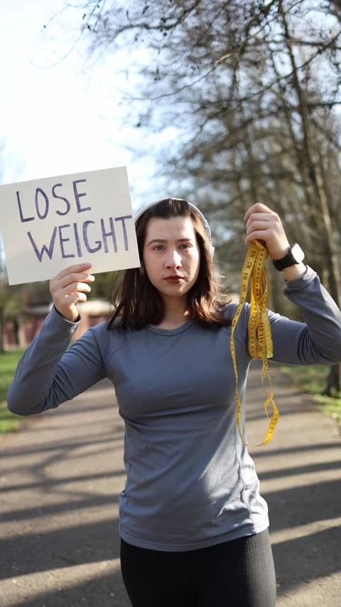 Vertical weight loss pressure concept Stock Footage 333100711