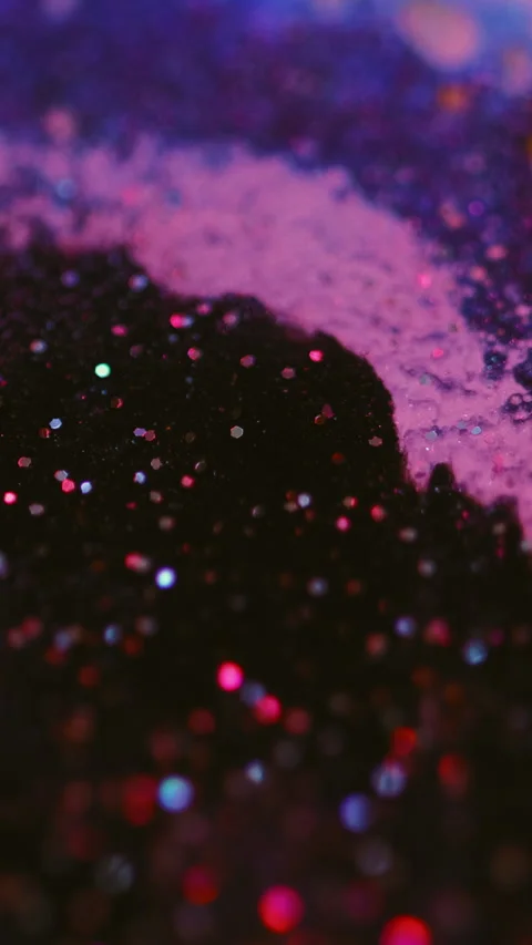 Vertical Wet glitter texture bokeh light purple red paint Video stock 285695748