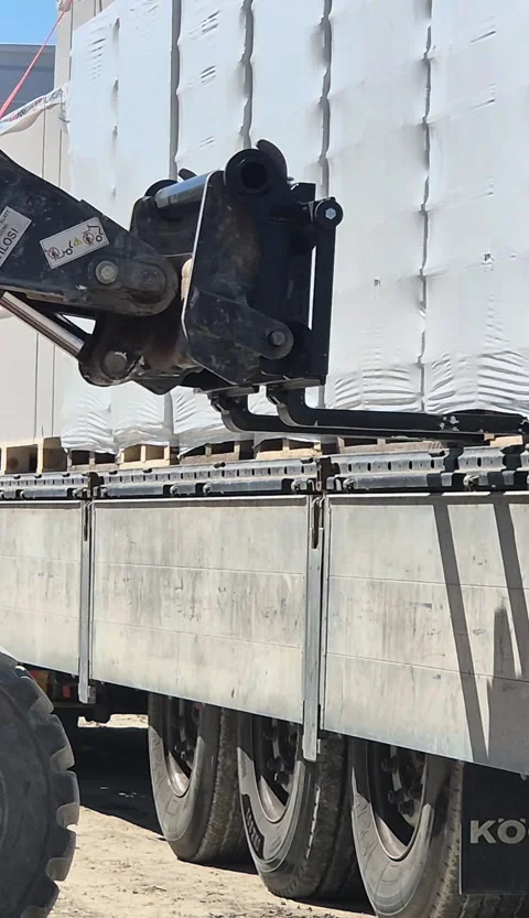 Vertical Wheel Loader Unloading Truck 9x16 Budapest Stock Footage 336333048