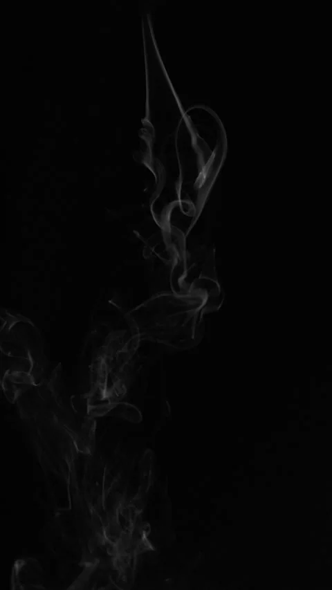Vertical white jet trails from aircraft on pure black background. Video stock 336933646