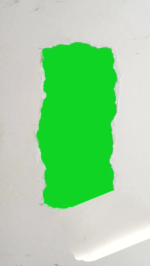 Vertical white paper jagged peeling vertical gap revealing animated on green Stockbeeldmateriaal 335216866
