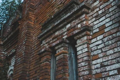 Vertical windows in an old brick building Stock Photos