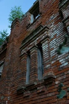 Vertical windows in an old brick building Stock Photos