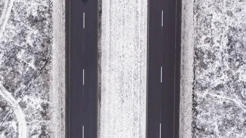 Vertical winter forest track aerial snowy road Stock Footage 255262643