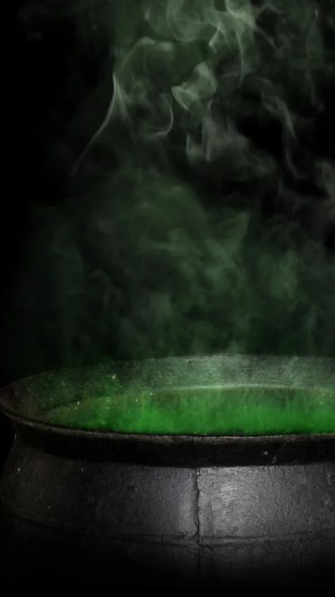 Vertical Witch Cauldron Smoking Green 4K Loop Stock Footage 275618539