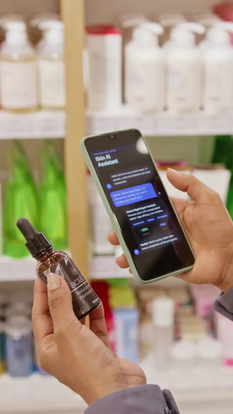Vertical of Woman Using Ai Assistant App on Smartphone for Skincare Shopping Stock Footage 345509796