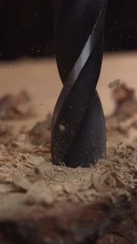 Vertical Woodwork: 4K Slow Motion Drill Stock Footage 265601184