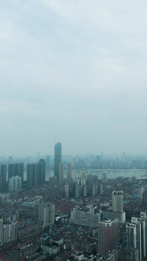 Vertical Wuhan City Skyscraper Sunset Glow Urban Motion Timelapse Stock Footage 327674320