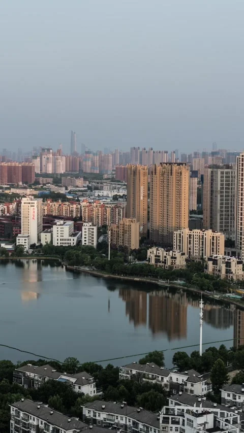 Vertical Wuhan City Skyscraper Sunset Glow Urban Motion Timelapse Stock Footage 327674480